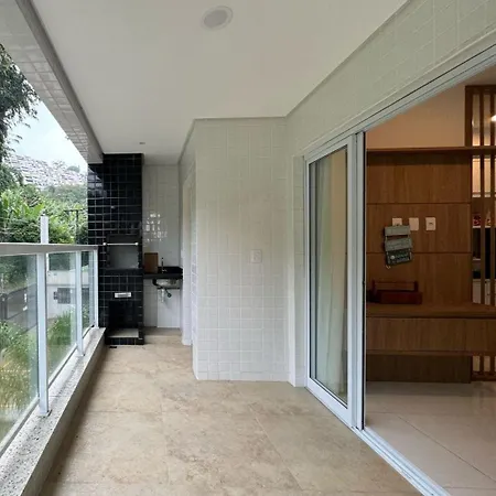 Apartamento novo a 350 m da praia das Toninhas em Ubatuba - 2 dormitórios sendo 1 suite, piscina, varanda gourmet com churrasqueira, ar condicionado, cozinha completa, garagem privativa-2